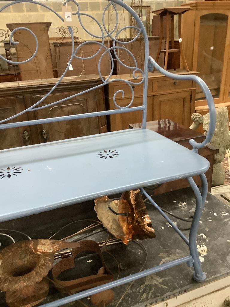 A painted wrought iron garden bench, length 123cm, depth 50cm, height 93cm